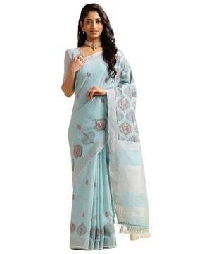 women embroidered saree with contrast border & tassels