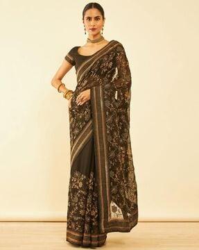 women embroidered saree with contrast border