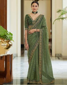 women embroidered saree with contrast border