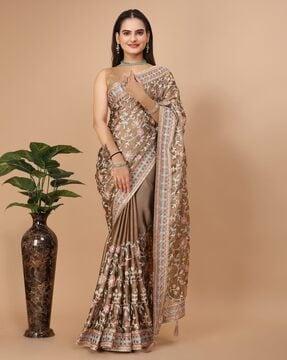 women embroidered saree with contrast border