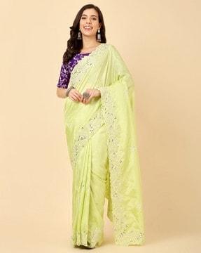 women embroidered saree with contrast border