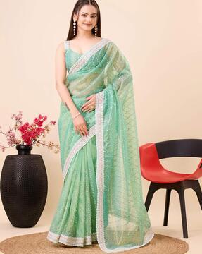 women embroidered saree with contrast border