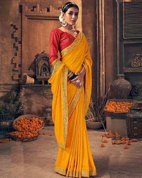 women embroidered saree with contrast border