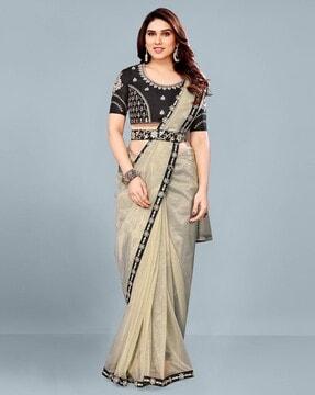 women embroidered saree with contrast border