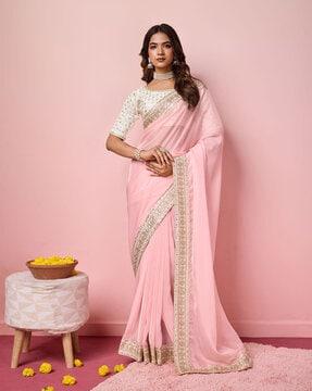 women embroidered saree with contrast border