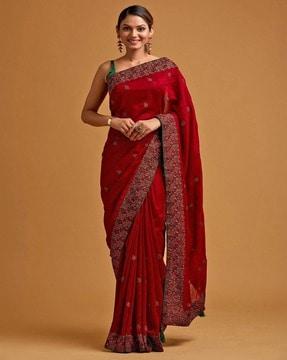 women embroidered saree with contrast border