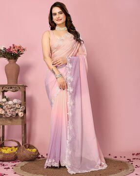 women embroidered saree with cut-out border