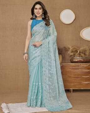 women embroidered saree with cutout border