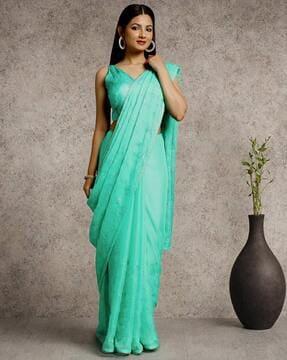 women embroidered saree with lace border