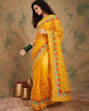 women embroidered saree with patch border