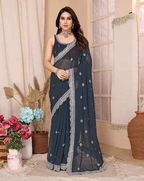 women embroidered saree with scalloped border