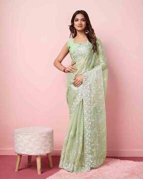 women embroidered saree with scalloped border