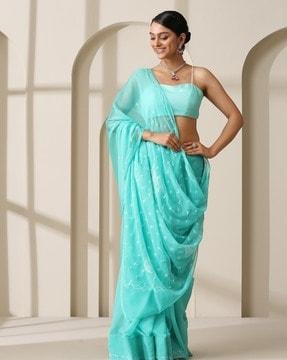 women embroidered saree with stitched hem