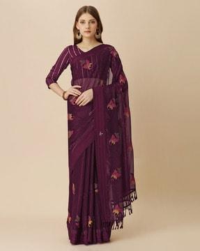 women embroidered saree with tassels