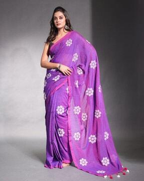 women embroidered saree with tassels