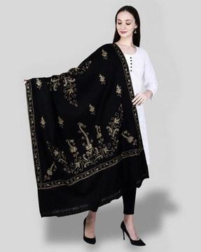 women embroidered shawl with frayed hem