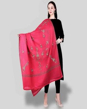 women embroidered shawl with frayed hem