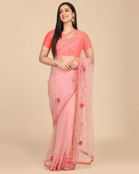 women embroidered sheer-through net saree