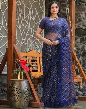 women embroidered sheer-through saree