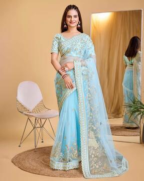 women embroidered sheer-through saree