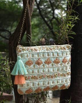women embroidered sling bag with detachable strap