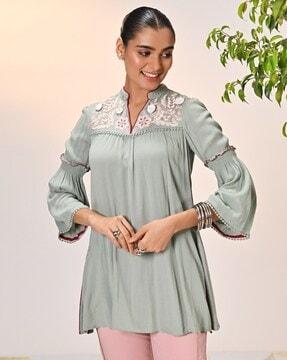 women embroidered tailored fit top
