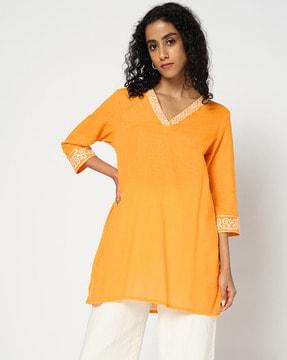 women embroidered tunic with insert pocket