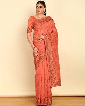 women embroidered tussar saree