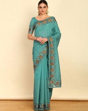 women embroidered tussar saree