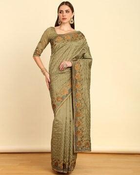 women embroidered tussar saree