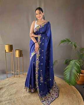 women embroidered tussar saree