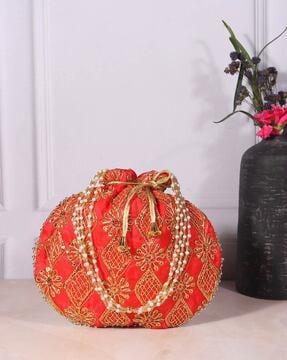 women embroidered wristlet with drawstring closure