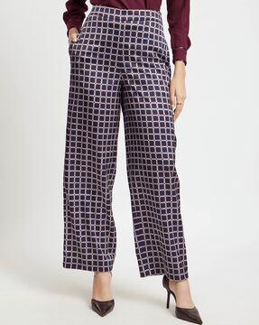 women flared flat-front pants