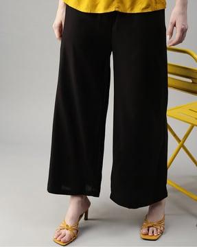 women flared flat-front pants