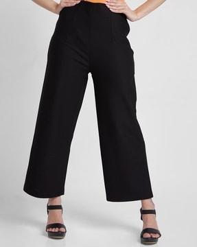 women flared flat-front trousers