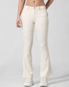 women flared jeans with insert pockets