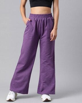 women flared track pants with insert pockets