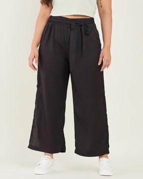 women flared trousers with insert pockets