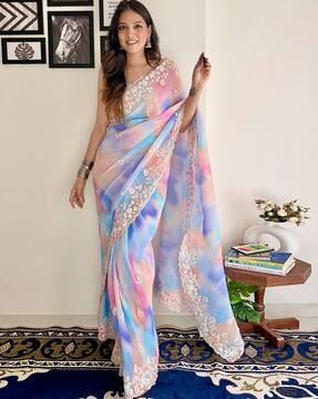 women floral embellished georgette saree