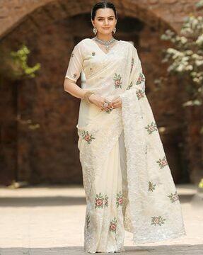 women floral pattern saree with embroidered border