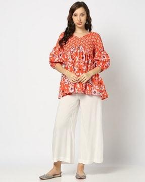 women floral print regular fit flared tunic