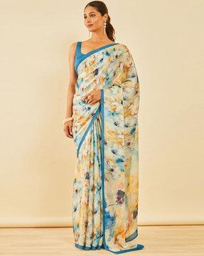 women floral print saree with contrast border