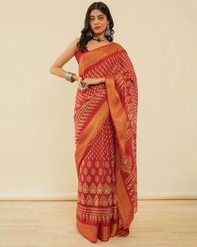 women floral print saree with contrast border