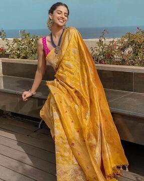 women floral woven banarasi silk saree with tassels