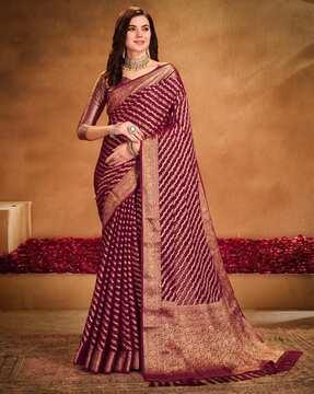 women floral woven georgette saree with tassels