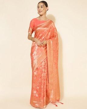 women floral woven saree with contrast border & tassels