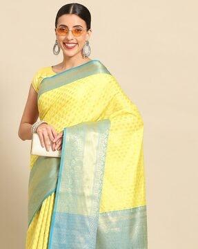 women floral woven saree with tassels