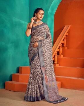 women geometric saree with contrast border