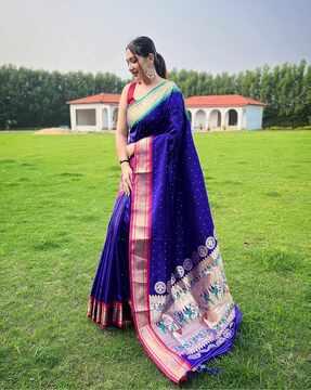 women geometric woven saree with tassels