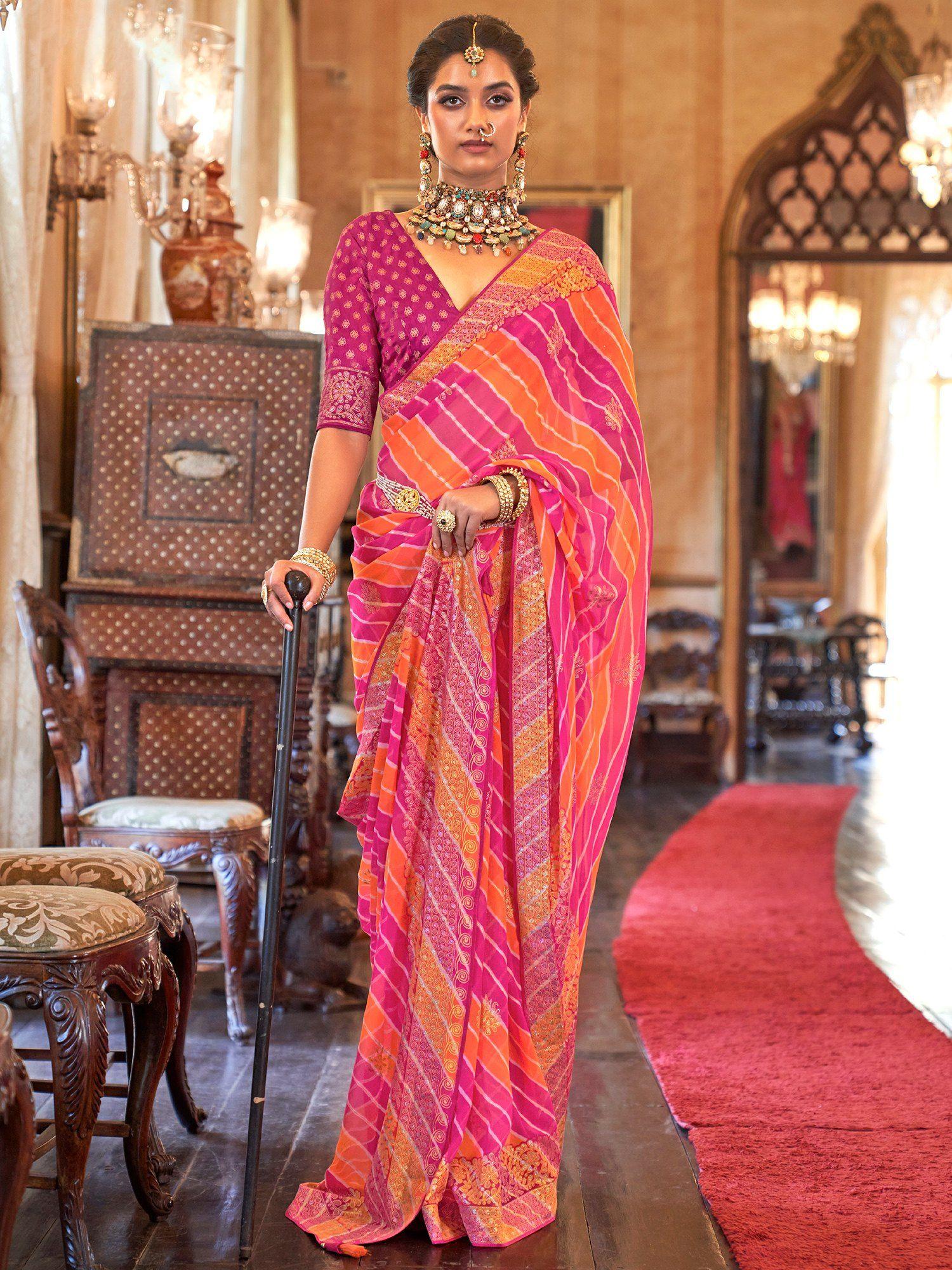 women georgette orange embellished designer saree with unstitched blouse piece